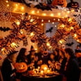 thumbnail image 4 of Cififendec Halloween Tinsel LED Garland, 118.1", Battery Operated Pumpkin Face Light String for Mantel Edge Swag, Door Trim Winding, Buffet Shelf Embellishment, 4 of 5