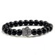 thumbnail image 1 of Pulsera con dije de huella de pata de piedra volcánica de lava negra mate natural, ideal como recuerdo para mascotas, amantes de los gatos y los perros., 1 of 2