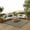 Brown, variant on Nourison Tulum 6' x 9' Taupe Ivory Outdoor Rug
