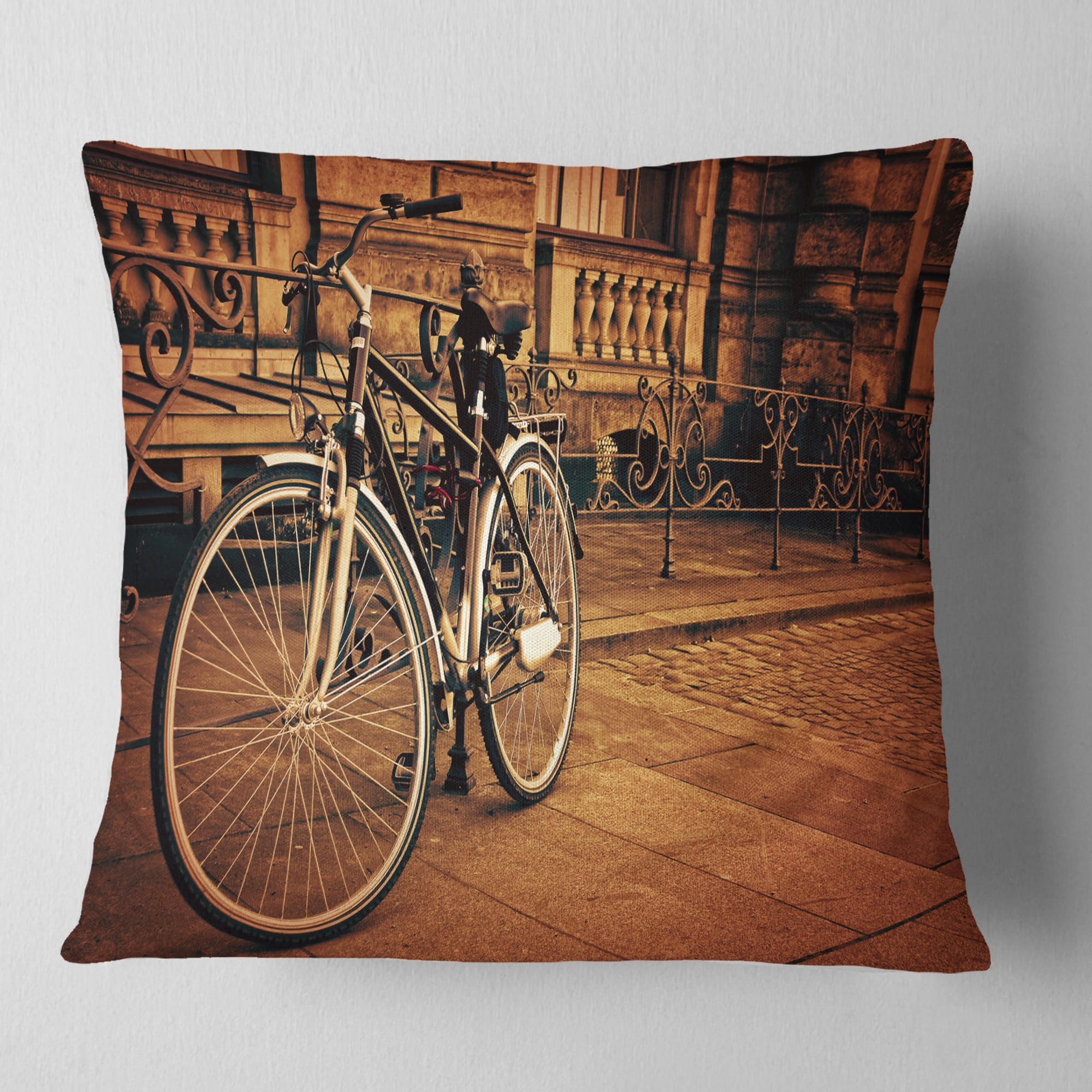 Designart Retro Bicycle against Stone Wall - Landscape Photography Throw Pillow - 16x16