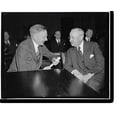 thumbnail image 2 of Historic Framed Print, S.E.C. chairman talks with monopoly witness. Washington, D.C., Feb. 8. Chairman of S.E.C. William Douglas [...] Frederick Ecker, chairman of the board of Met, 17-7/8" x 21-7/8", 2 of 9