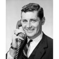 thumbnail image 2 of Mid adult businessman talking on telephone Poster Print (18 x 24), 2 of 4
