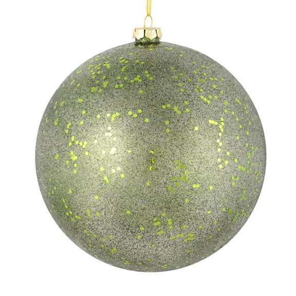Vickerman 4.75" Moss Green Glitter Clear Ball. This ornament features a clear complexion with a dusting of moss green glitter inside. Add a touch of glam to any holiday arrangement with this delicate