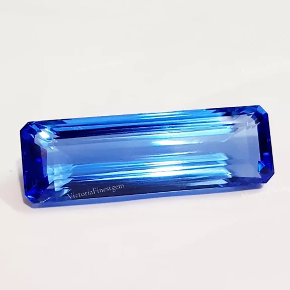 Between 63.30 Ct Blue Topaz Glass Filled Stone Loose Gemstone Baguette Shape Blue Color Pendent