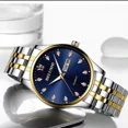 thumbnail image 2 of Reloj Acero Inoxidable Brillantes Fechador Contra Agua Bs Correa Plata/Oro, 2 of 7