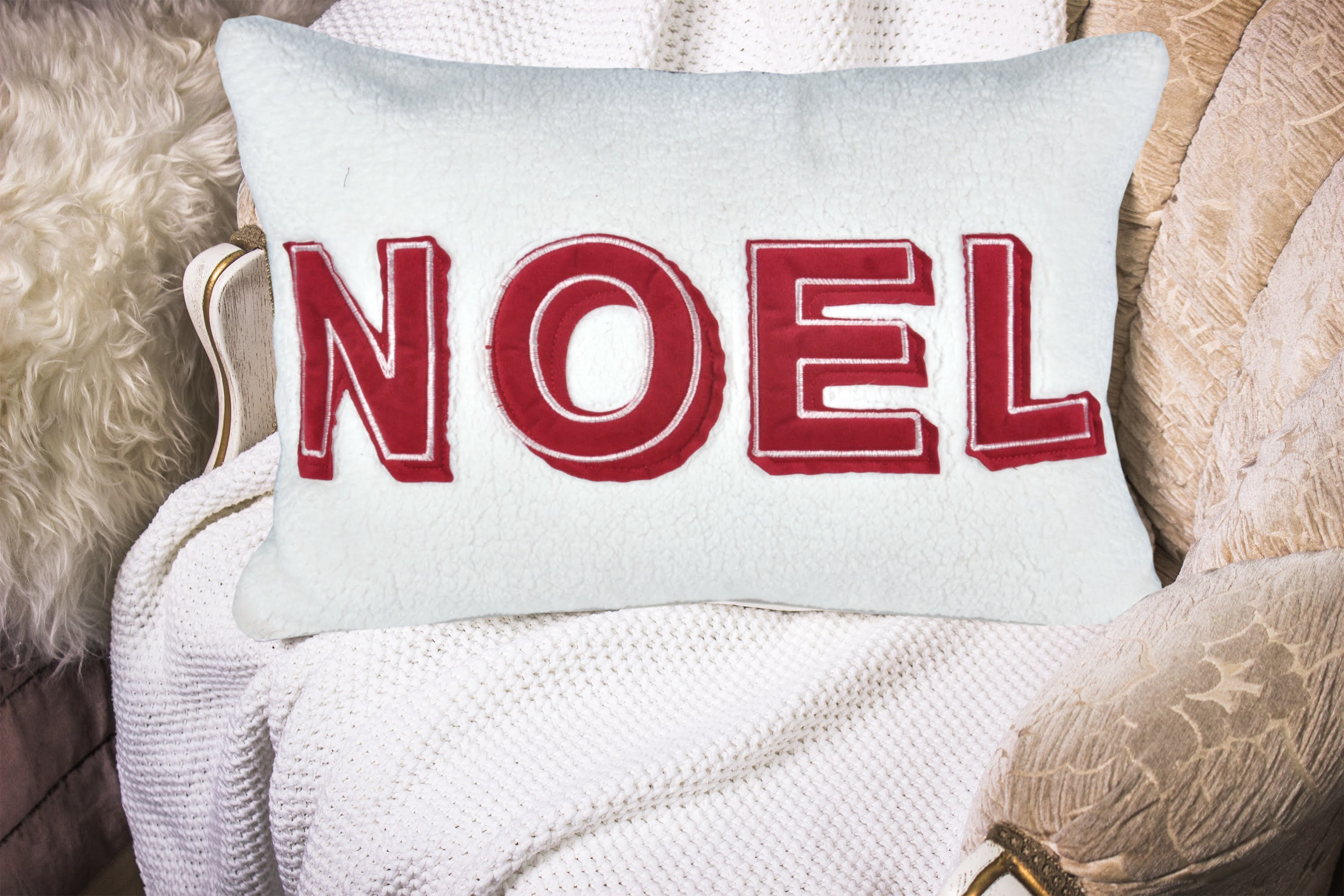 Noel Sherpa Throw Pillow with Red Stitching 14x20 Inch Cozy Christmas Holiday Decor