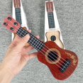 thumbnail image 2 of Mini Instrument de Musique Simulation Ukulélé Guitare Quatre Cordes Éducation Précoce - B3F5, 2 of 9