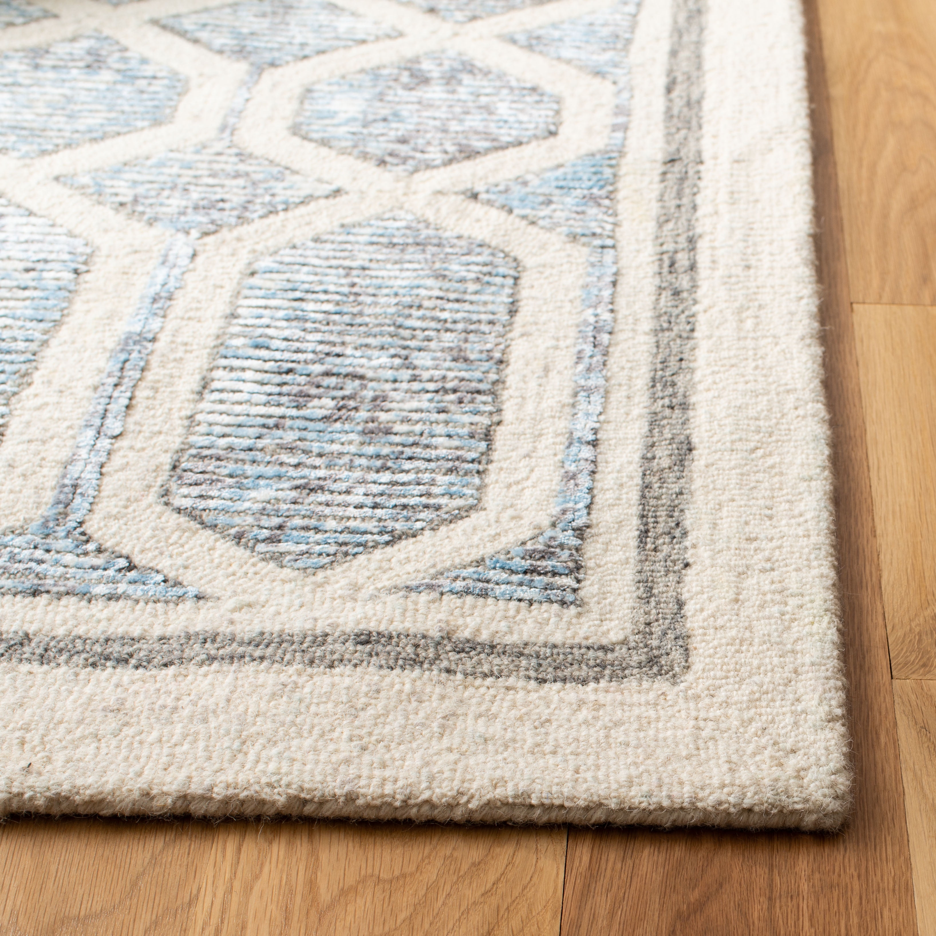SAFAVIEH Artistry Jorie Geometric Area Rug, Ivory/Blue, 6' x 9'