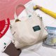 thumbnail image 5 of Jumpingount Bolso bandolera para niñas, bolso de mano para Notebook, teléfono, bolso cuadrado con cremallera, bolsa de gran capacidad, regalos para fiestas Bolsas de mensajero y de hombro Beige Jumpingount AP010303-04B, 5 of 6