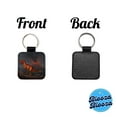 thumbnail image 4 of Carnotaurus Volcano Erupting Dinosaur Faux Leather Square Keychain, 4 of 7