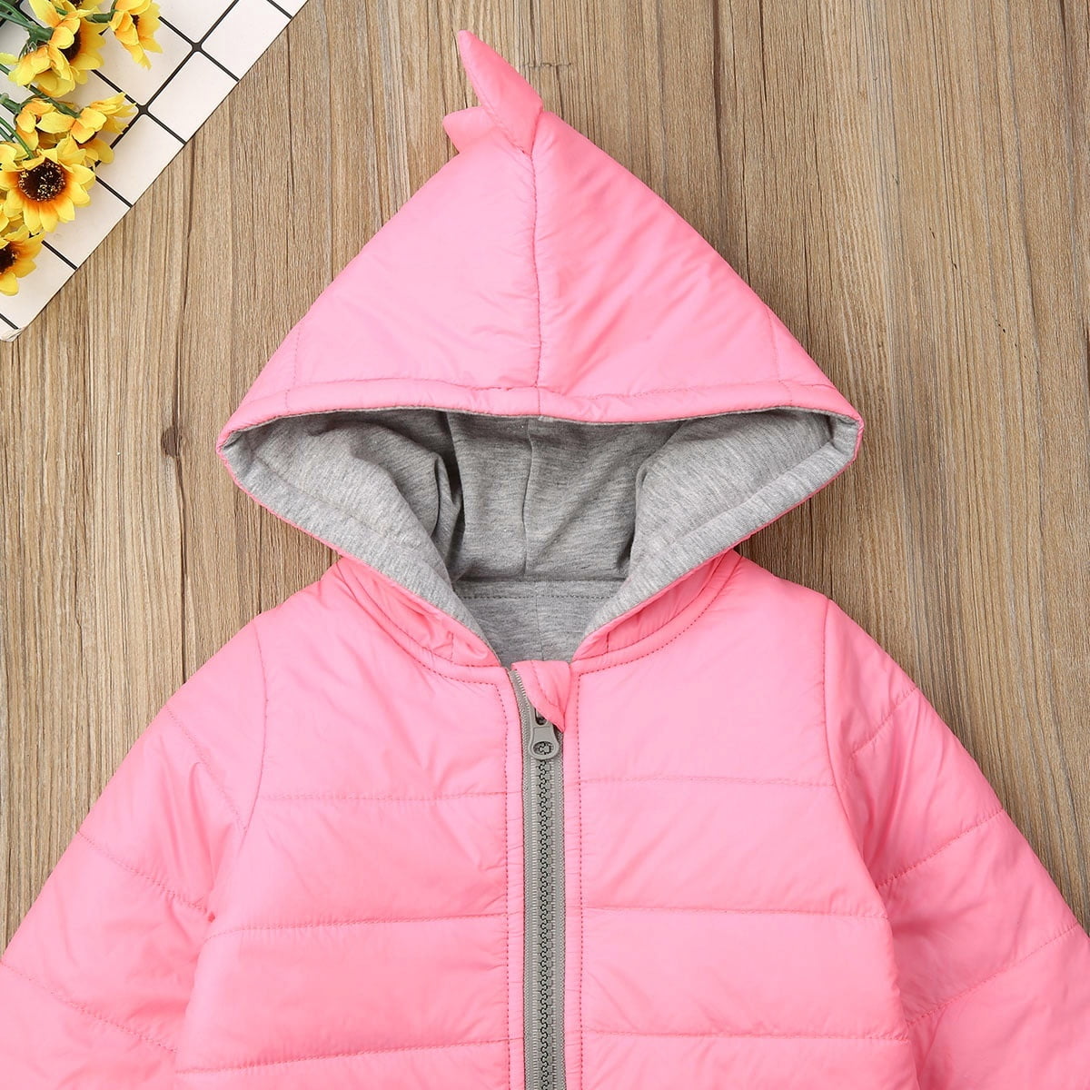 pink dinosaur coat