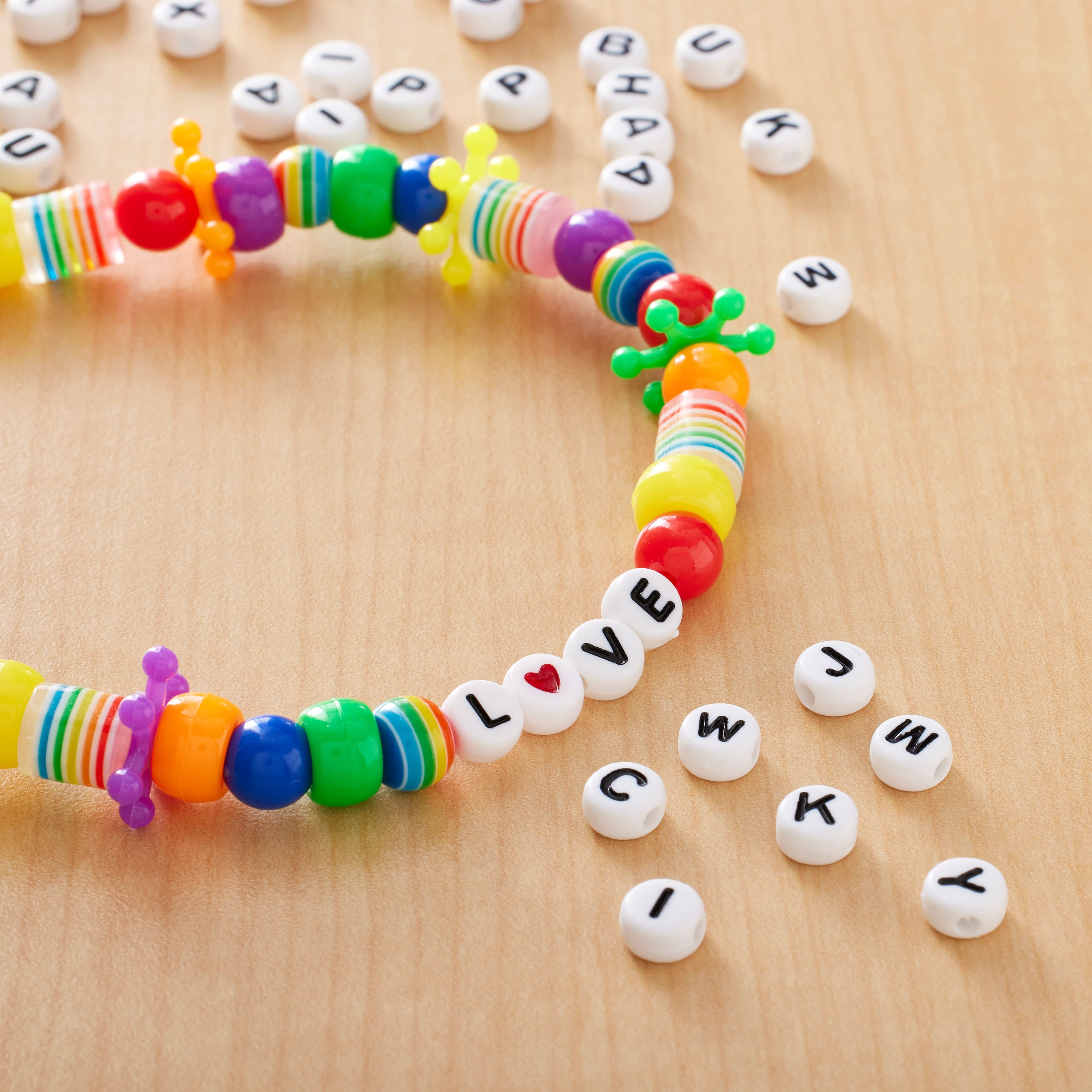 12 Packs: 340 ct. (4,080 total) White Circular Alphabet Beads by Creatology - 7.5mm
