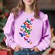 thumbnail image 1 of Vestido de verano para niña con estampado de flores de Pascua, manga corta, bolsillos con volantes y cuello redondo, top de poliéster, 1 of 5