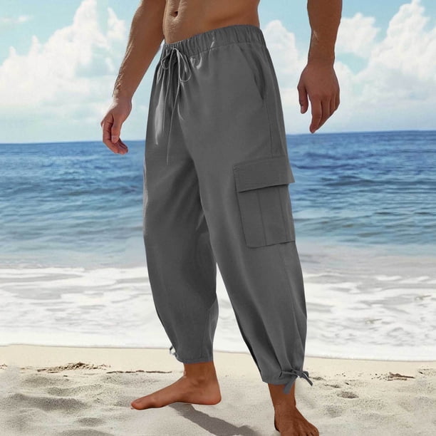 Pantalones largos para hombre, de color liso, holgados, informales, con bolsillos grandes, de lino, cintura elástica y cordón ajustable, de poliéster.