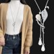 thumbnail image 1 of Collar de cadena de suéter de payaso de cristal para mujer, estilo coreano, con cadena de suéter para ropa, colgante de borla larga, 1 of 6