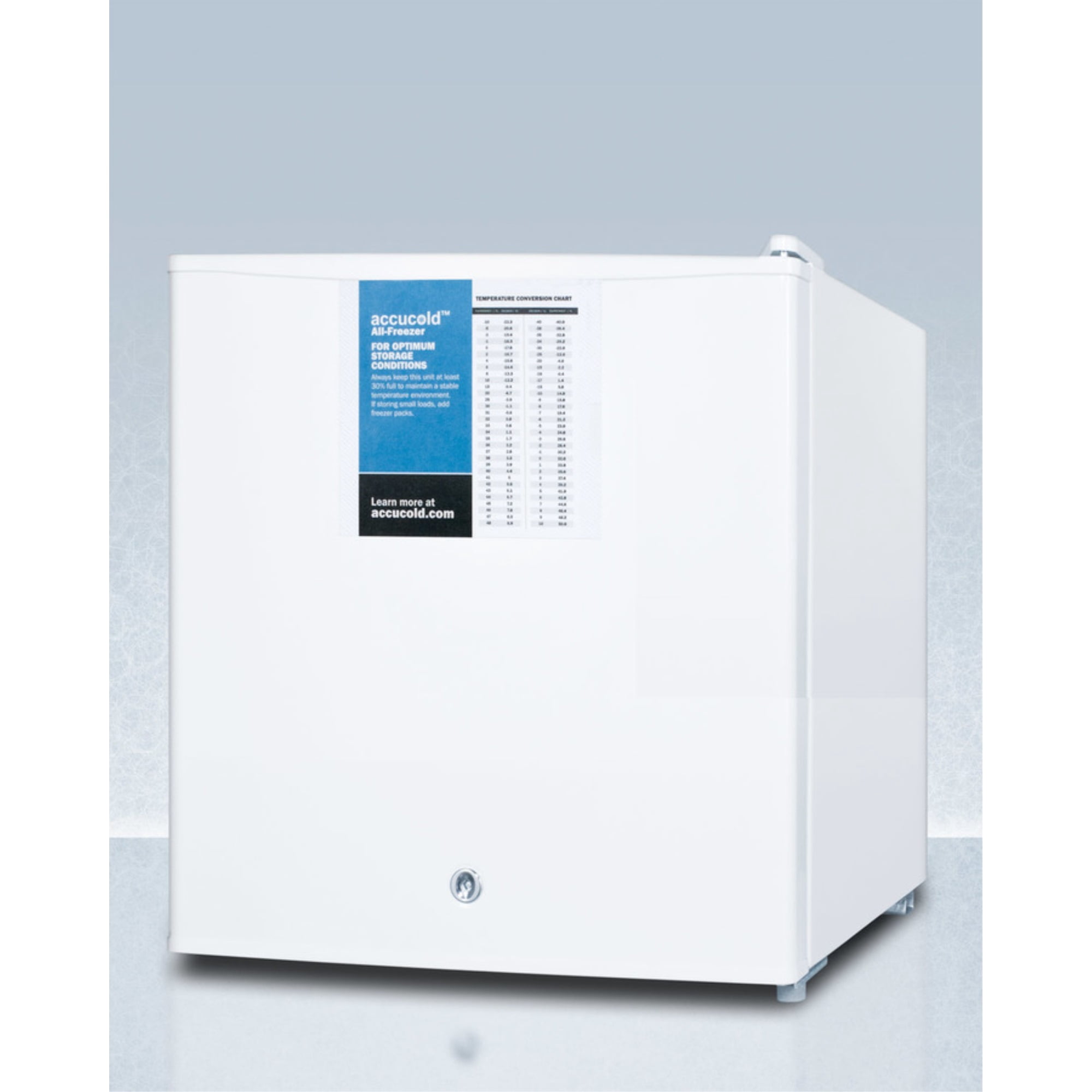 Compact manual defrost all-freezer with lock and probe hole