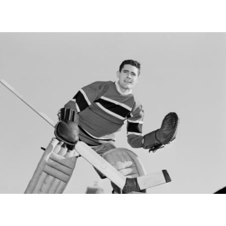 Mid adult hockey player Canvas Art -  (18 x 24)