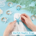 thumbnail image 3 of Juego de 6 servilleteros con forma de estrella de mar, blancos y azules. 6 estilos diferentes., 3 of 6