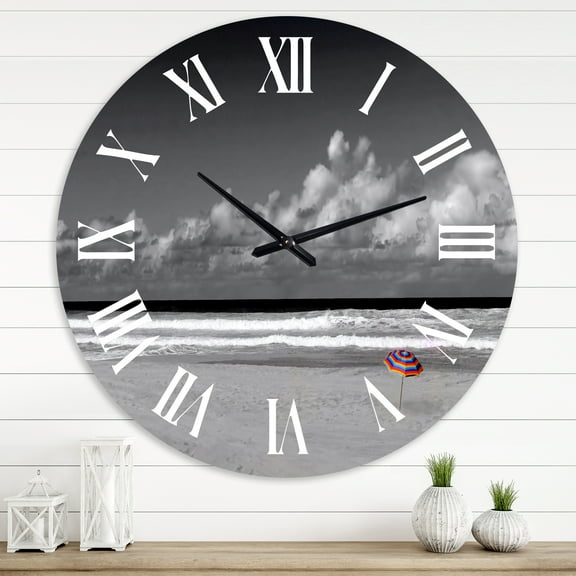 Designart 'Monochrome Coastline Under Cloudy Sky' Lake House Wall Clock