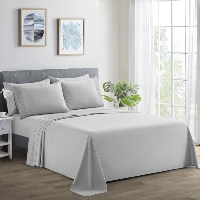 Silver Marina Decoration ultra soft silky rayon from bamboo deep pocket sheet set displayed on a made bed with matching pillowcases in a bright, modern bedroom.