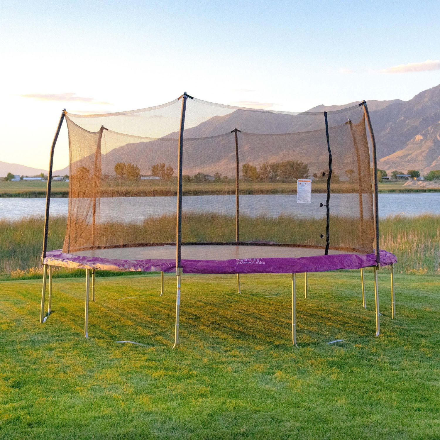 SKYWALKER TRAMPOLINES 17 FT Purple, Oval Outdoor Trampoline for Kids with Safety Enclosure Net and Spring Pad, ASTM Approval, Rust Resistant