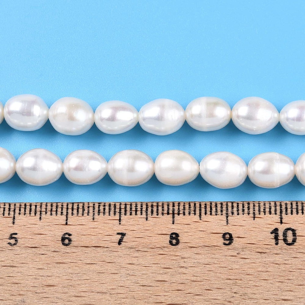 Natural Cultured Freshwater Pearl Beads Strands Rice Creamy White 8~9.5x6~7.5mm Hole: 0.7mm about 41~42pcs/strand 13.98~14.37 inch(35.5~36.5cm)