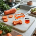 thumbnail image 4 of Dog bone shaped cookie cutter set - Large 4.45 inch, Small 2.95 inch, Mini 1.53 inch, stainless steel with plastic lid, for making dog treat cookies., 4 of 5