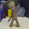 thumbnail image 4 of Figura de acción de Groot de Guardianes de la Galaxia de 25 cm, linda figura de hombre árbol bebé, estatua, muñeca, modelo coleccionable, juguete para regalo de niños, 4 of 5