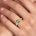 thumbnail image 4 of Gem Stone King 925 Sterling Silver Green Peridot and White Lab Grown Diamond 3 Stone Engagement Ring for Women | 1.50 Cttw | Oval 8X6MM | Round 2MM | Gemstone August Birthstone | Size 6, 4 of 6
