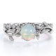 thumbnail image 1 of JeenMata Anillo Nupcial con Diseño de Hoja de Rama de Moissanita y Ópalo de Fuego Redondo de 0,65 Quilates Engastado en Garras con Solitario en Baño de Oro Blanco de 18 K sobre Plata, 1 of 6