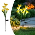 thumbnail image 1 of Luces de suelo de flor de lirio solar, paquete de 2 lámparas decorativas de jardín al aire libre, luces de estaca LED impermeables de 27.56 ", decoración de patio multicolor con energía solar, 1 of 6
