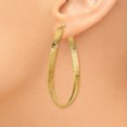 thumbnail image 3 of 14K Yellow Gold Textured Twisted Oval Hoop Earrings, 3 of 6