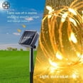 thumbnail image 5 of Luxtrada 100 LED 33ft Solar String Lights 8 Modes Solar Powered Copper Wire Fairy Lights IP65 Waterproof Indoor Outdoor Lighting for Home, Garden, Party, Path, Lawn, Wedding, Christmas, DIY Decoration, 5 of 9