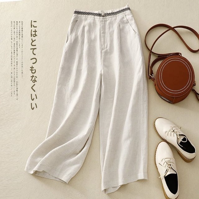pantalones anchos artísticos de algodón y lino de talla grande para mujer, pantalones casuales 30 % — pantalones palazzo de corte amplio y cintura alta con detalle tejido en la pretina, mezcla 95 % algodón y lino y largo siete puntos; colocados sobre fondo neutro junto a bolso y zapatos, estilo étnico artístico y ajuste relajado, también aptos para viajes y días casuales.