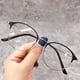 thumbnail image 2 of Gafas Redondas De Protección Contra Radiación Lentes Intercambiables De Mujer Hombres Moda Azul Luz Bloqueo Marco Metal Vintage Acero Cuero, 2 of 4