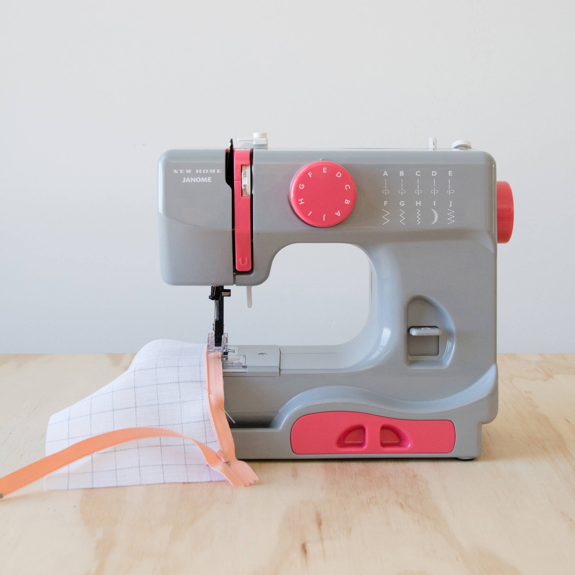 Janome Graceful Gray Basic 10-Stitch Sewing Machine with Built-in Accessory Tray