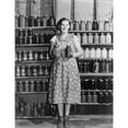 thumbnail image 2 of Housewife Proudly Displays Her Home Grown And Canned Food. Mesa County History (18 x 24), 2 of 2