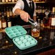 thumbnail image 1 of Molde de hielo reutilizable de silicona con 9 cavidades grandes en forma de balón de fútbol, apto para uso alimentario, flexible, con tapa, ideal para cócteles, whisky y uso en barra de casa., 1 of 7