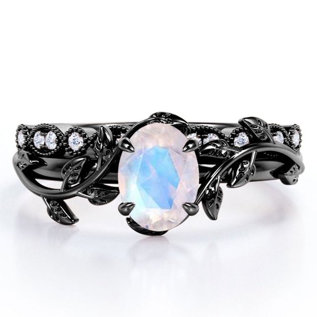 JeenMata Anillo de Novia con Diseño de Hojas Estilo Art Déco, Filigrana Milgrain, Piedra Lunar Azul de Corte Ovalado de 1,5 Quilates y Moissanita, Chapado en Oro Negro de 18 K sobre Plata