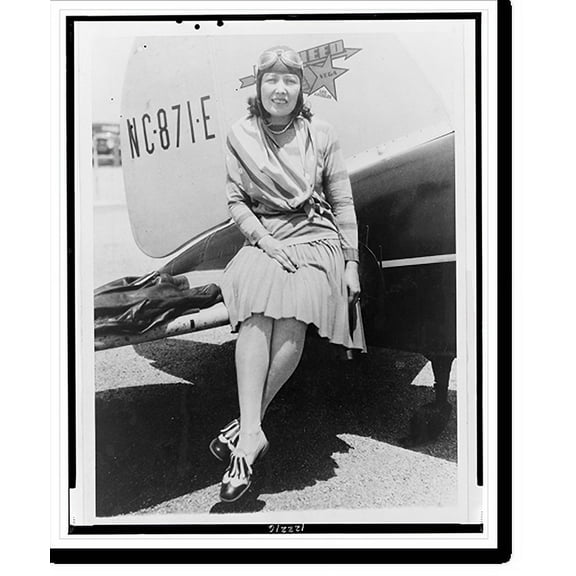 Historic Print, [Claire May Fahy, full-length portrait, facing front, seated on outside tail of airplane], 16" x 20"