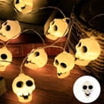 thumbnail image 5 of Skull Shaped String Lights, Warm White Halloween LED Decorative Lights, Spooky Ambient Light Strings, Battery Powered Waterproof Lighting for Indoor Halloween Party Home Decor (59in 10 Lights), 5 of 6