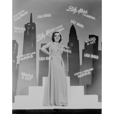 Judy Garland dancing infront of shadows of skyline +tograph High Photo