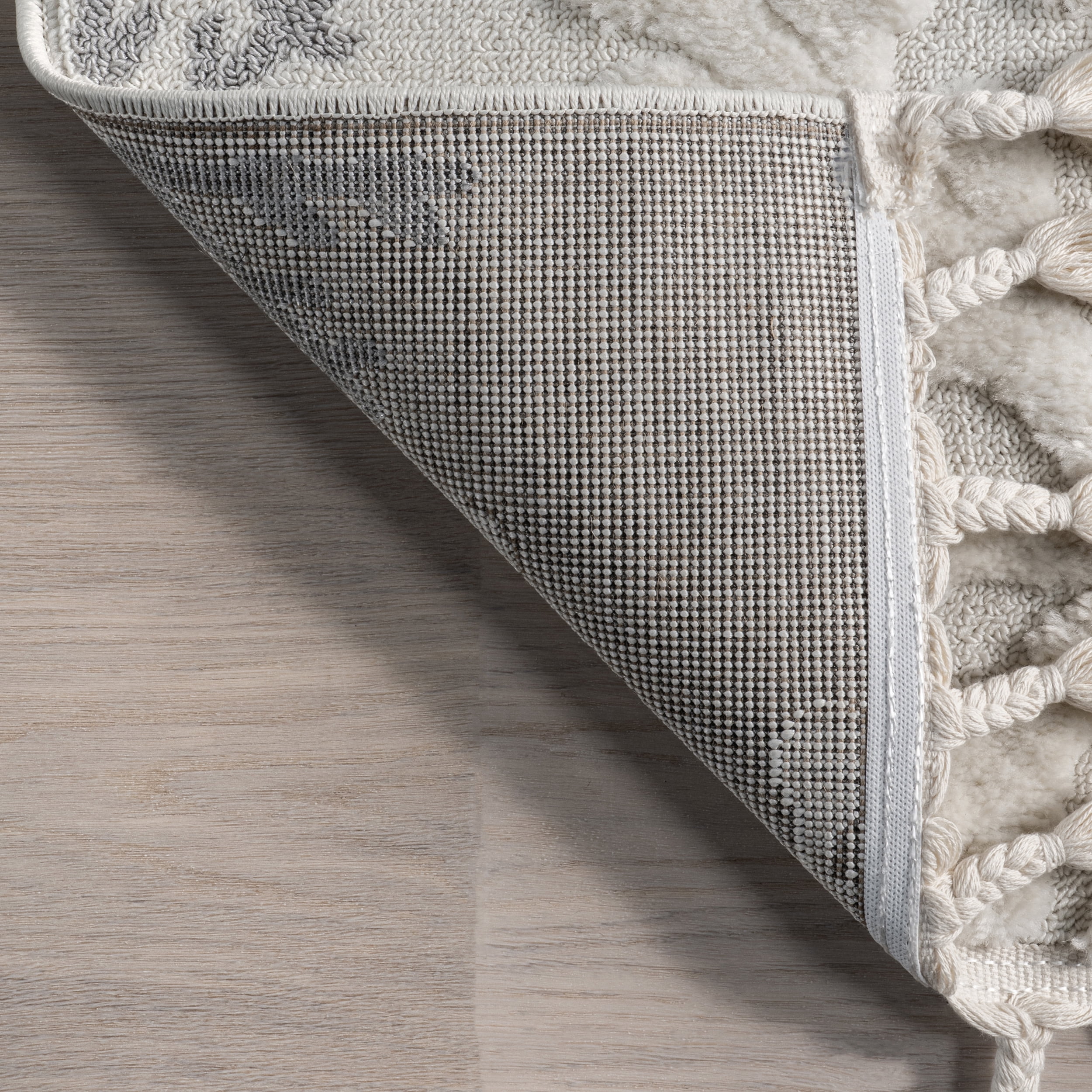 nuLOOM Unity High-Low Snowflake Tasseled Area Rug, 6' 7" x 9', Light Grey