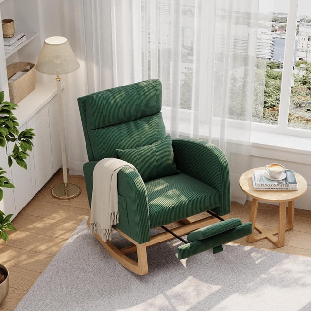 Modern Nursery Rocking Chair by Garvee in green boucle upholstery, featuring an adjustable footrest, ergonomic backrest, and side pocket. The chair is set in a bright living room with a wooden floor, a side table holding a book and coffee, and a floor lamp nearby. Designed for comfort and versatility, it offers smooth rocking motion and supports up to 300 lbs.