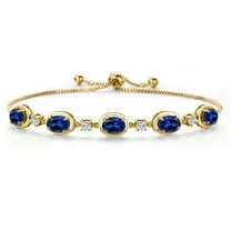 Gem Stone King 18K Yellow Gold Plated Silver Blue Created Sapphire Bracelet for Women | 5.00 Cttw | Gemstone September Birthstone | Oval 7X5MM | Fully Adjustable 9 inch