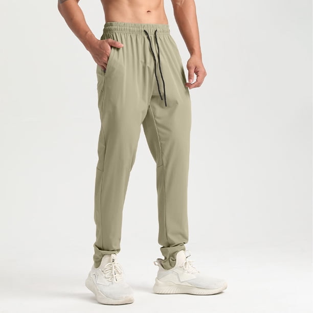 Pantalones largos para hombre, casuales, de moda, de color sólido, con cordón, cintura elástica y bolsillos.
