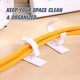 thumbnail image 4 of Xihbxyly Organizador de Cables Autoadhesivo, Plástico Duradero, Adhesivo Fuerte para Una Fácil Instalación, Ideal para Oficina, Hogar y Coche. Juego de 4 Clips, Tamaño Pequeño y Grande., 4 of 7