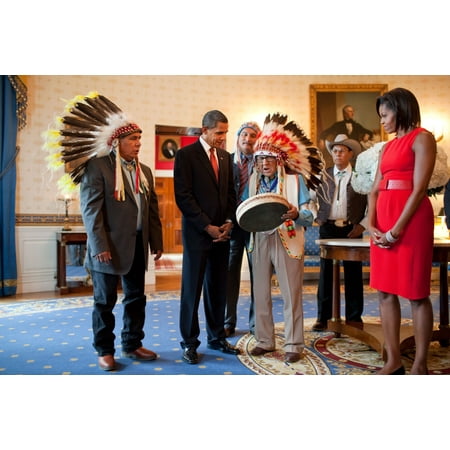 Presidential Medal Of Freedom Presidential Medal Of Freedom Recipient Joseph Medicine Crow Historian Author And Ww Ii Veteran Shows A Drum To President Obama And Michelle Obama Michelle Wears A Belted Orange Dress By Moises De La ()