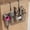 Black, variant on Sofinny 3-in-1 Hair Dryer Holder Hanging Cabinet Door/Adhesive Wall Mount/Countertop, Adjustable Height Hair Tool organizer Under Sink, Metal-Black