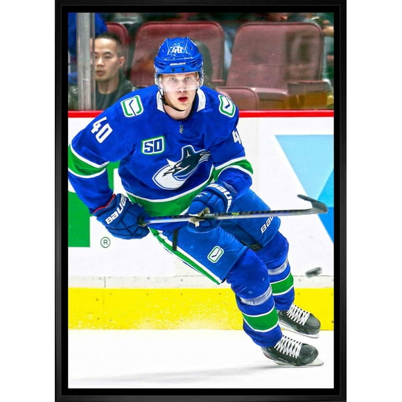 Frameworth Elias Pettersson 20x29 Canvas Framed Canucks Action
